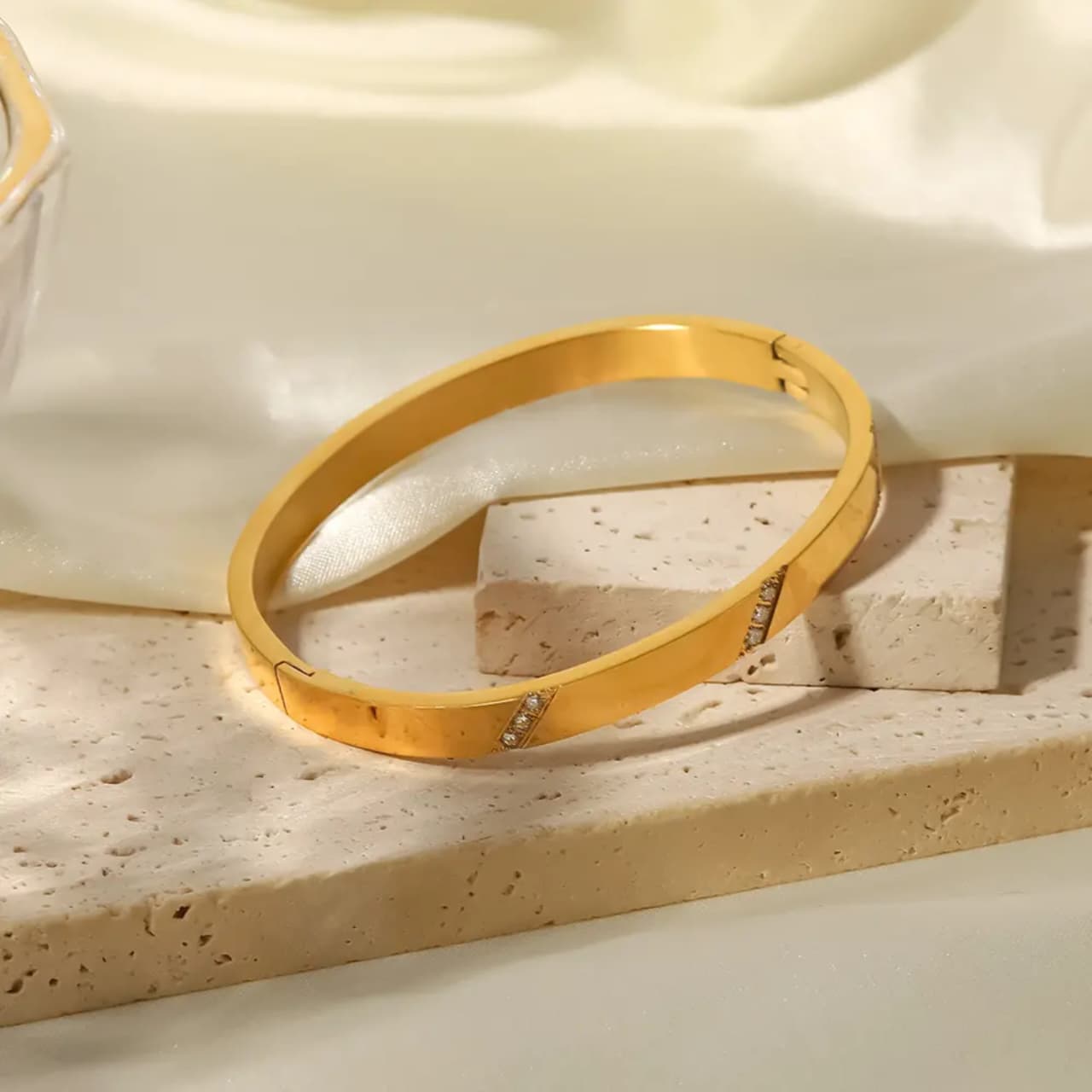 Sleek Gold-Plated Bracelet with Diamond Cut Accents