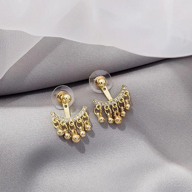 Celeste Gold Dangle Stud Earrings
