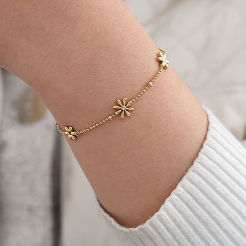 Golden Daisy Charm Bracelet