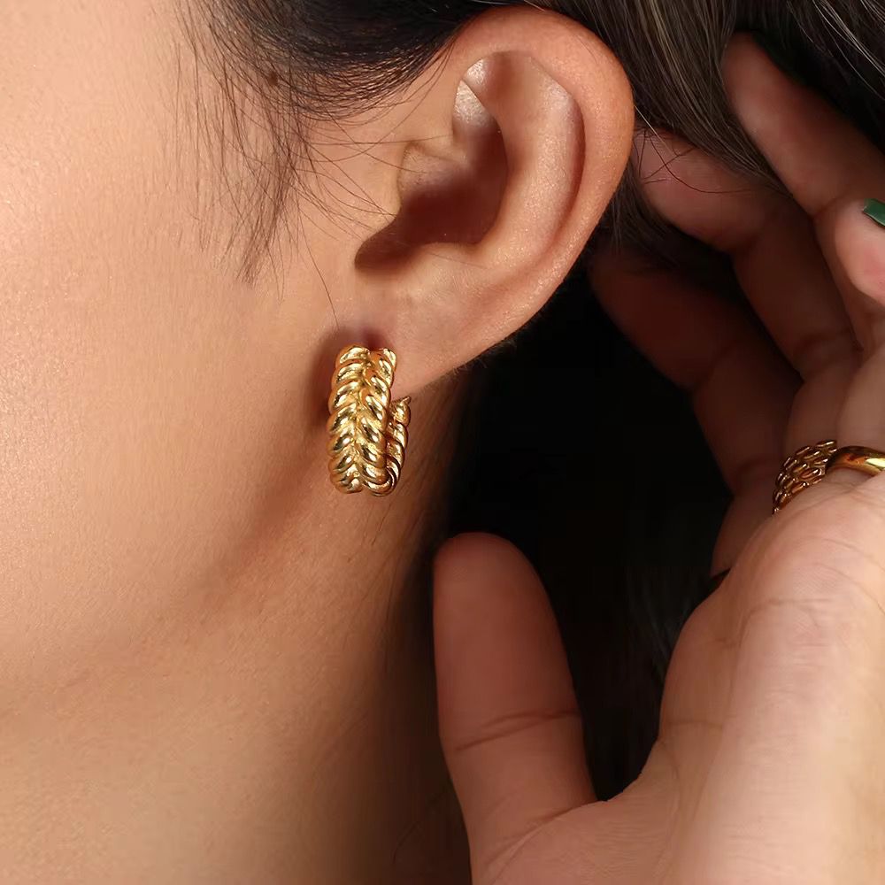 Aurora Twist Bold Gold Hoop Earrings