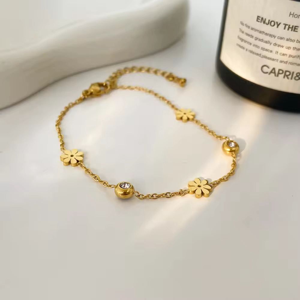 Golden Daisy Charm Bracelet