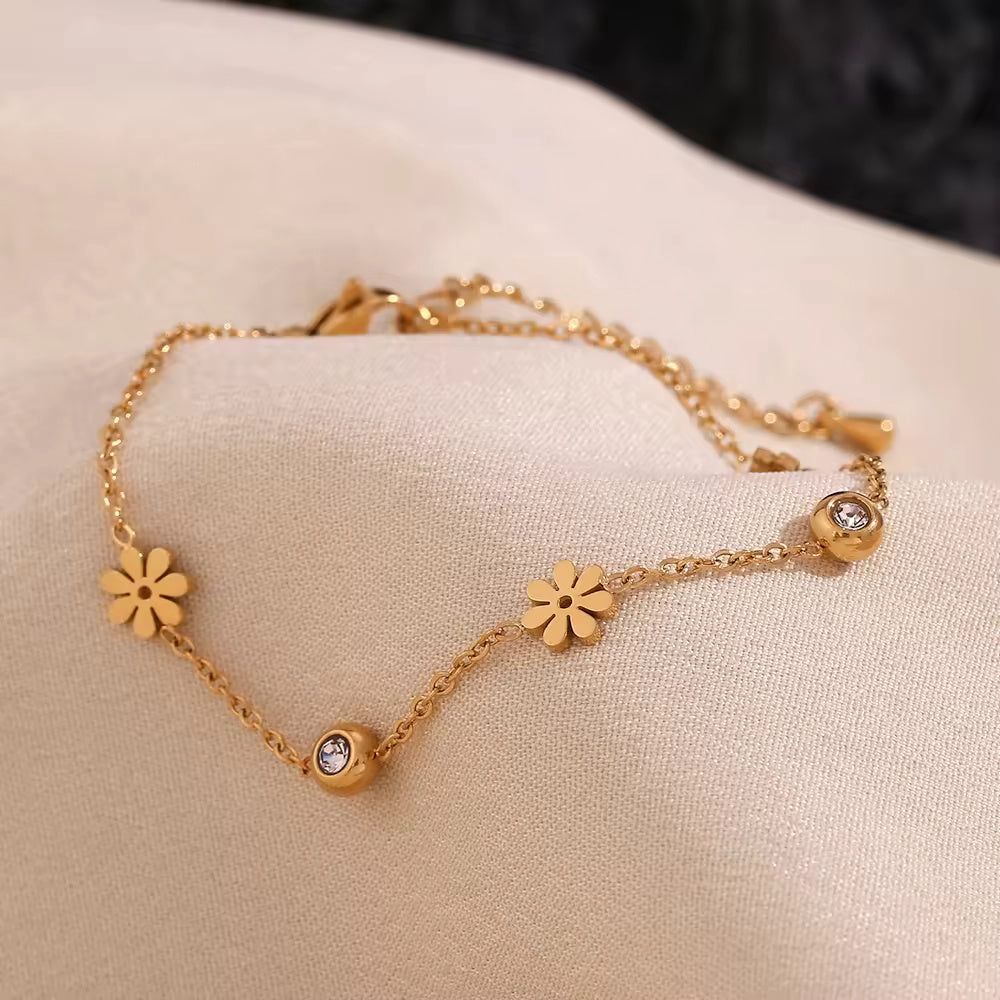 Golden Daisy Charm Bracelet