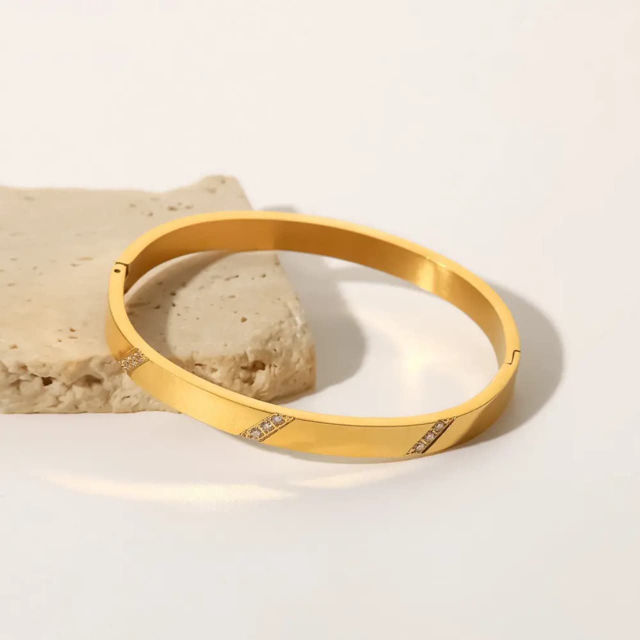 Sleek Gold-Plated Bracelet with Diamond Cut Accents