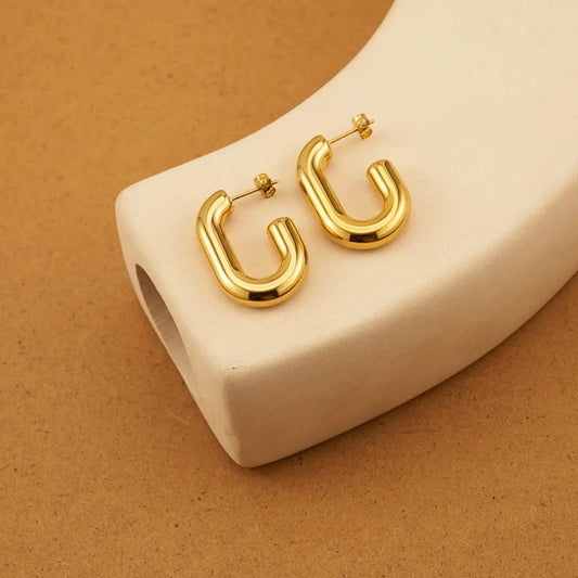 Bold Curve Gold Hoop Earrings