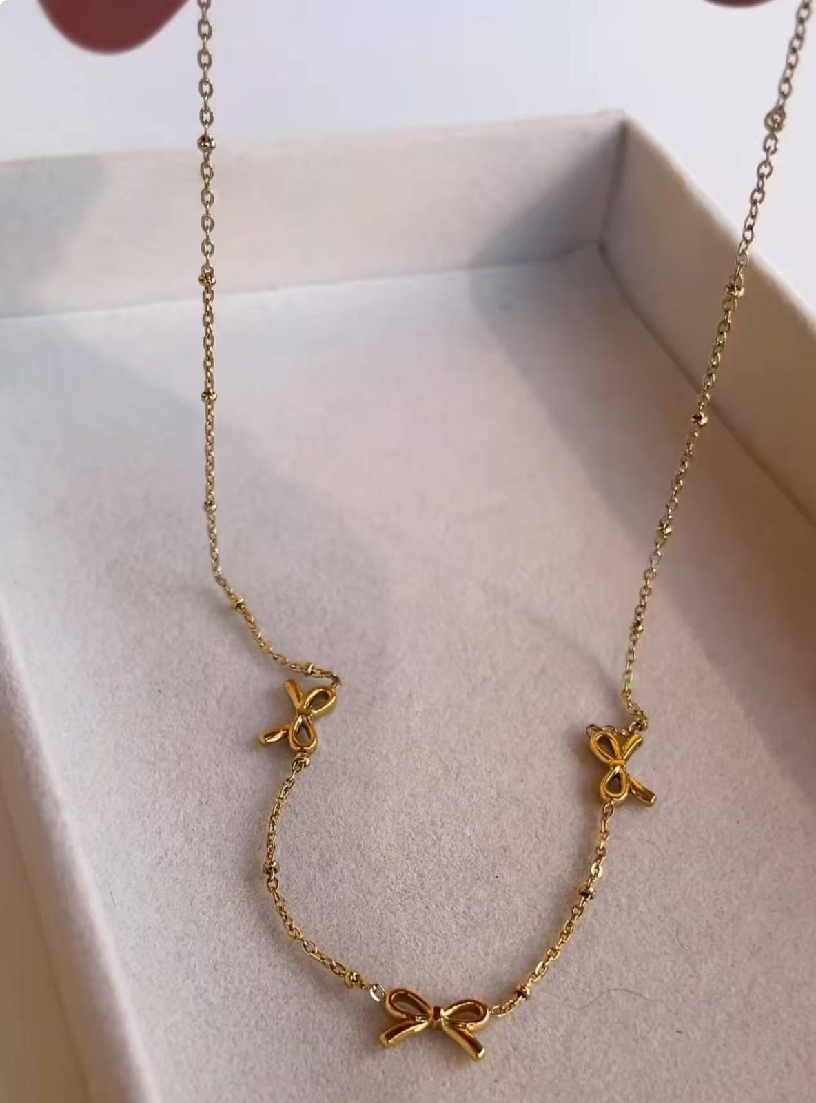Golden Grace Ribbon Charm Necklace
