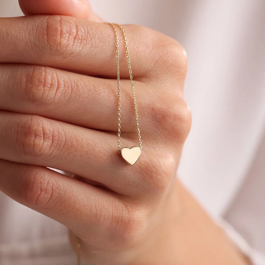 Golden Heartbeat Pendant Necklace